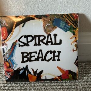 CD - unopened - spiral beach